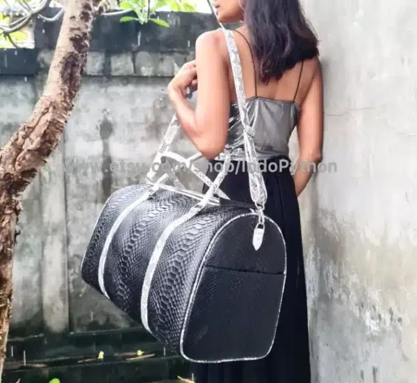 Black and white snakeskin travel bag from Indo Python Store