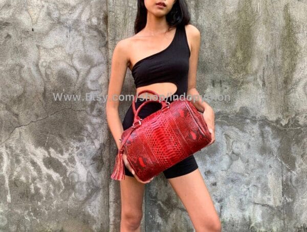 Red and black medium size bag from Indo Python Store